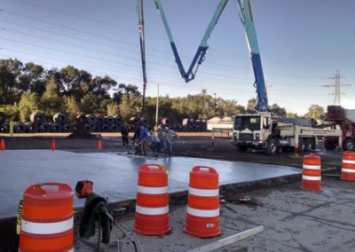 Pouring concrete for a building approach at Steel Warehouse in South Bend, IN