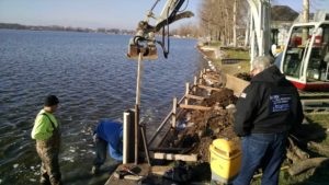 Driving sheet piles for a seawall project at Lake of The Woods in Bremen, IN
