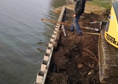 Completed sheet piles for seawall project at Lake of The Woods in Bremen, IN